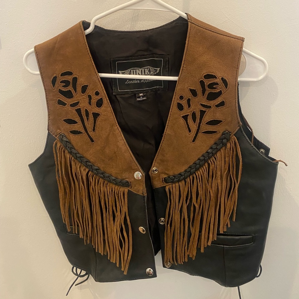 Authentic & vintage Leather Biker Jacket with the original makers card.